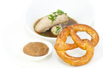 sausages in beer sauce with mustard and pastries