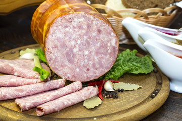 sausage on a wooden plate in a restaurant