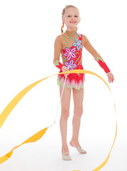 Obraz premium girl gymnast with ribbon.