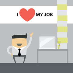 Happy businessman near his workspace at office.