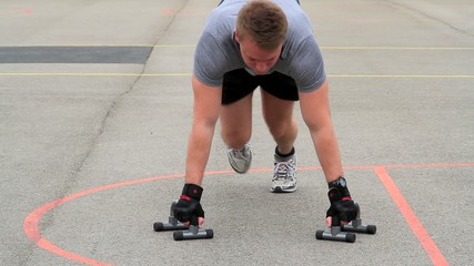 Young man doing push up