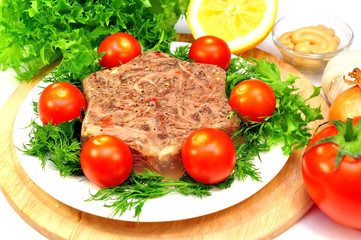jellied meat with fresh herbs and cherry tomatoes