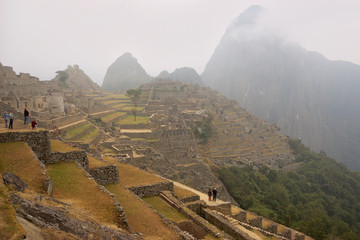 Fototapeta premium Peru - Machu Picchu through the fog