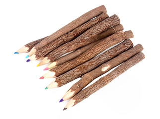 Wooden color pencils on a white background