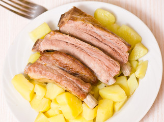 roasted pork ribs with potatoes