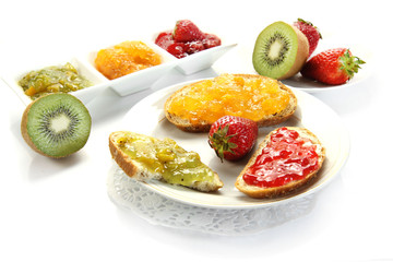  jam with slices of bread on white background