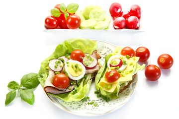 spring healthy sandwich with vegetable and smoked ham on white b