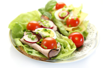 spring healthy sandwich with vegetable and smoked ham on white b