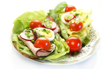 spring healthy sandwich with vegetable and smoked ham on white b