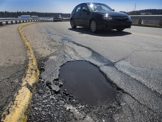 Pothole road damage