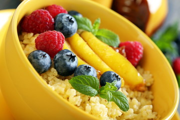 Tasty wheat porridge with berries fruit.