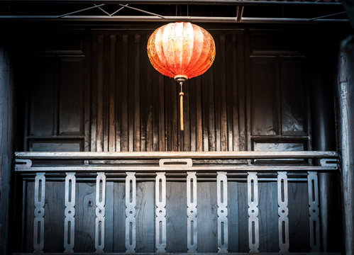 Lantern hanging in front of house, Vietnam.