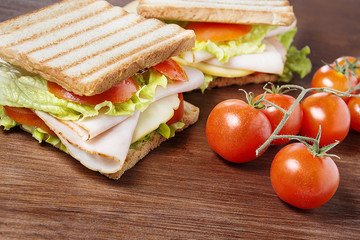 sandwiches on wooden table
