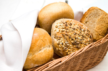 Wicker basket of freshly baked dinner rolls