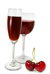 glasses   with wine   and berries cherry on white background