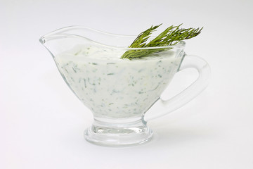 Spicy cream sauce with dill in sauceboat
