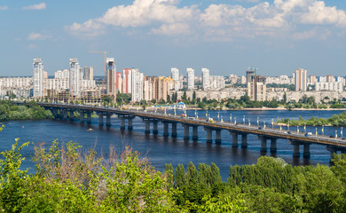 Naklejka premium View of Paton Bridge and Left Bank of the Dnieper river in Kyiv