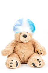 Cute teddy bear with swimming cap