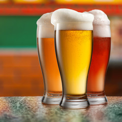 Different beer in glasses in pub