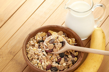 Delicious and healthy cereal in bowl with milk