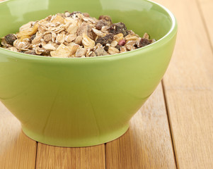 Delicious and healthy cereal in bowl with milk