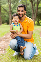 Fototapeta premium happy indian father and son