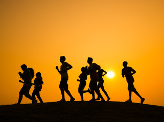 Group of People Running Outdoors