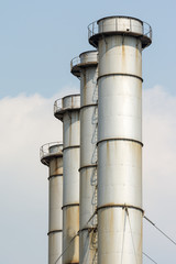 Coal Power Plant Towers Against Blue Sky