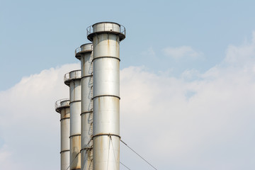 Coal Power Plant Towers Against Blue Sky