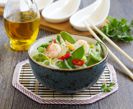 Asian soup with shrimp and vegetables.