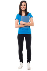 Fototapeta premium Beautiful young woman with notebook