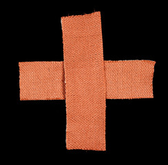Band aid isolated over a black background