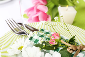 Table setting with spring flowers close up