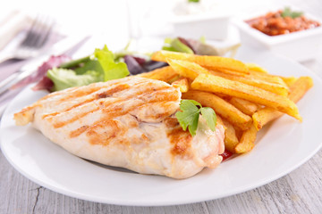 grilled chicken breast and fries