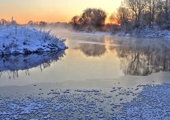 Winter. River. Sunset