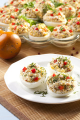 stuffed eggs with ham, red pepper and dill