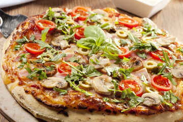 Pizza with ham and mushrooms