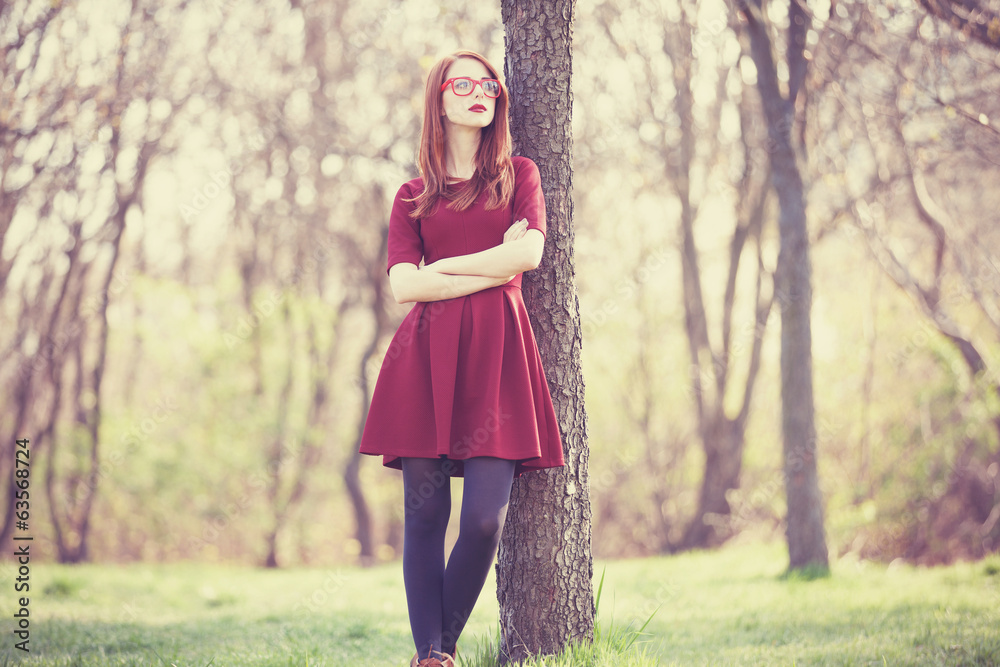 Sticker redhead women in a park