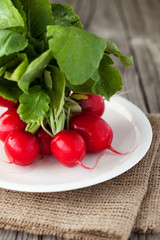 Fresh radish on a wooden table