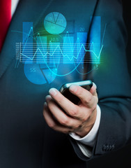 Businessman and phone projection with graphs