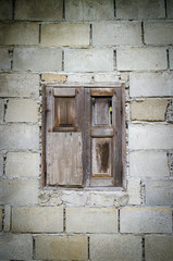 background of old brick wall with vintage window