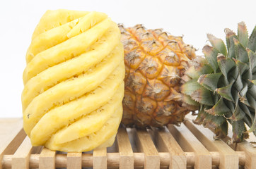 Fototapeta na wymiar Fresh slice pineapple on white background
