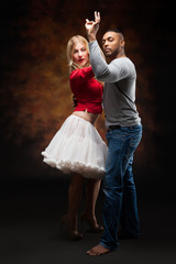 Young couple dances Caribbean Salsa
