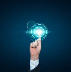 A finger pushing the digital button