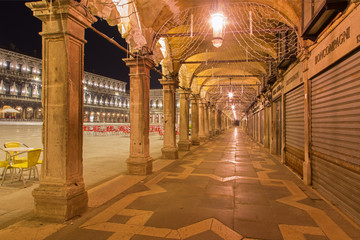 Fototapeta na wymiar Venice - Portico of Saint Mark square at night