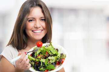 Woman eating a healthy salad