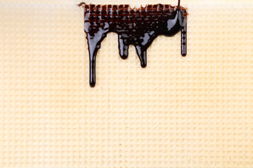 Waffle background with hazelnuts cream.