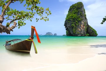 Fotobehang Railay Beach, Krabi, Thailand Tropical beach traditional long tail boat andaman sea thailand