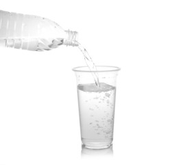 Pour into a glass isolated on a white background.