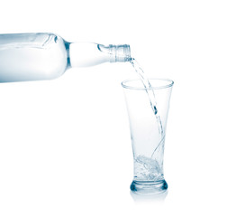 Pour into a glass isolated on a white background.